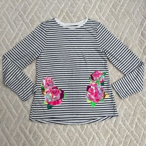 Long sleeve shirt for a girl.